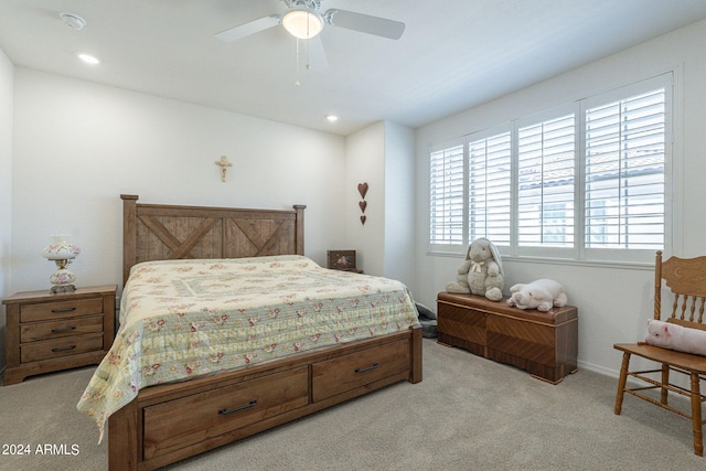 carpeted bedroom featuring ceiling fan