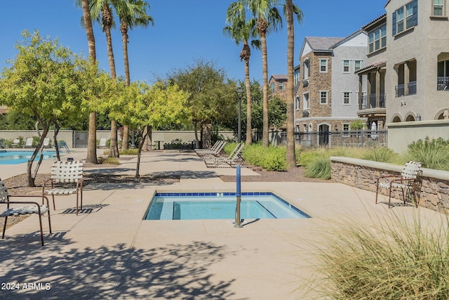 view of pool featuring a patio area