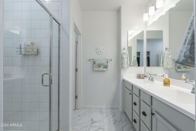 bathroom with vanity and walk in shower