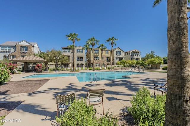 view of pool with a gazebo and a patio