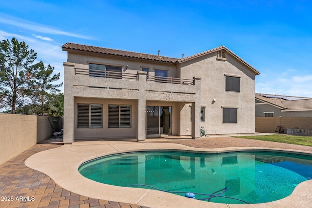 view of pool featuring a patio area, a fenced in pool, and a fenced backyard