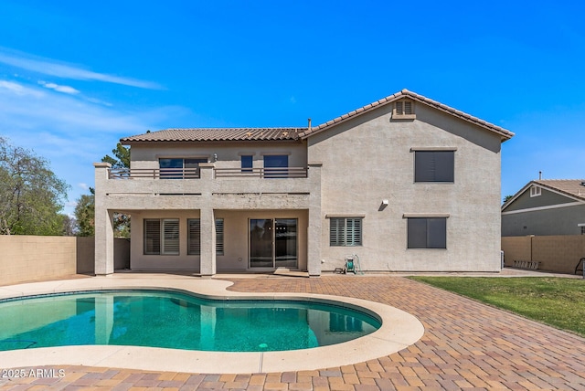 view of pool featuring a fenced in pool, a fenced backyard, and a patio area