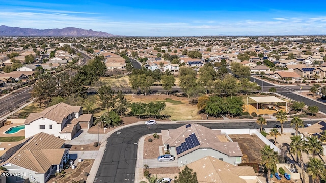 birds eye view of property featuring a mountain view and a residential view