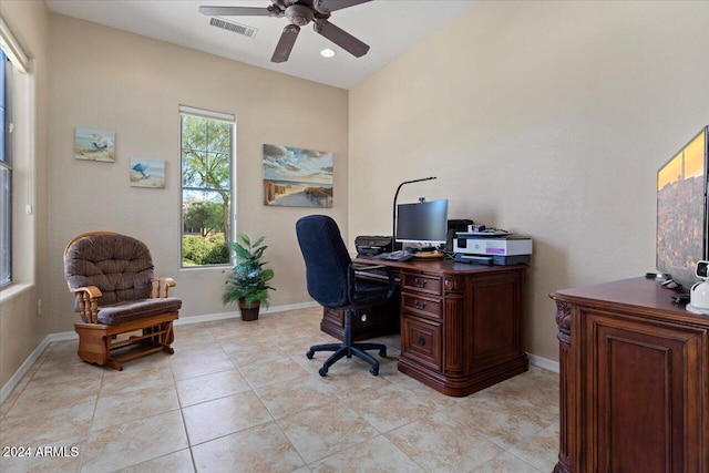 office area with light tile patterned flooring and ceiling fan