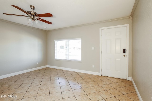 empty room featuring ceiling fan, light tile patterned floors, and crown molding