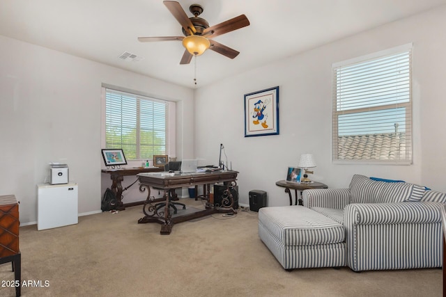 office featuring light carpet and ceiling fan