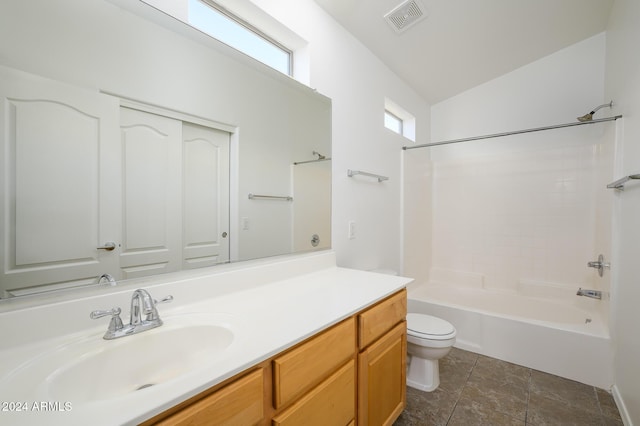 bathroom featuring toilet, shower / bath combination, visible vents, vaulted ceiling, and vanity