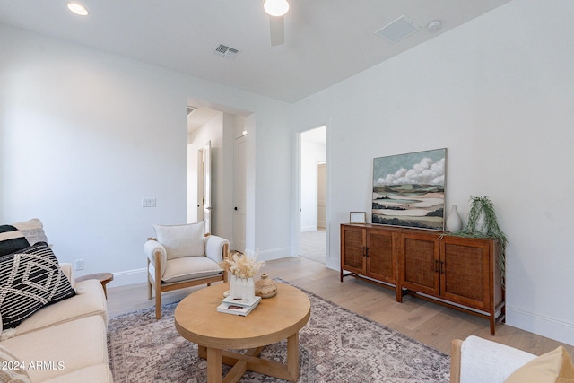 6926 N 177th Pl, Waddell, AZ 85355 - living room featuring ceiling fan, light wood-type flooring, and baseboards