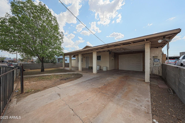 1614 S 6th Ave, Phoenix, AZ 85003 - ranch-style house featuring a garage, concrete driveway, and a carport