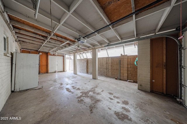 1614 S 6th Ave, Phoenix, AZ 85003 - garage with a garage door opener and a storage shed