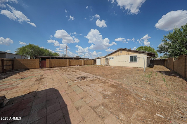 1614 S 6th Ave, Phoenix, AZ 85003 - back of house with a patio and a fenced backyard
