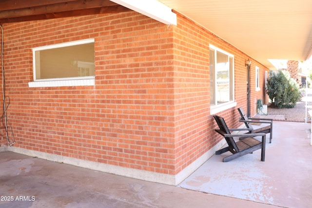 view of home's exterior featuring brick siding