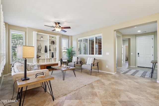 living room featuring ceiling fan