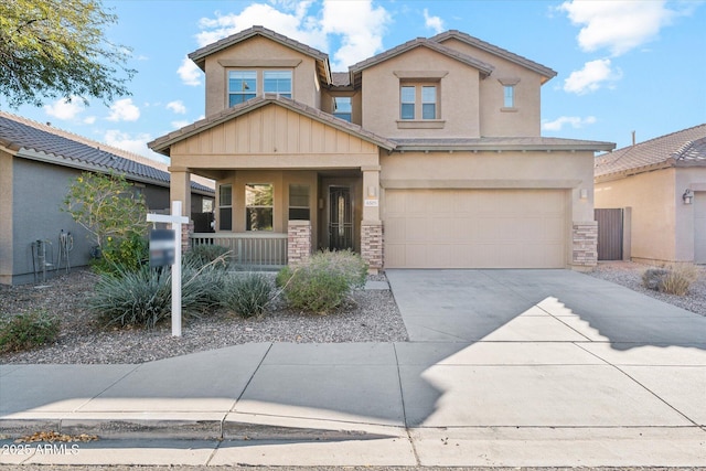 craftsman inspired home with a porch and a garage