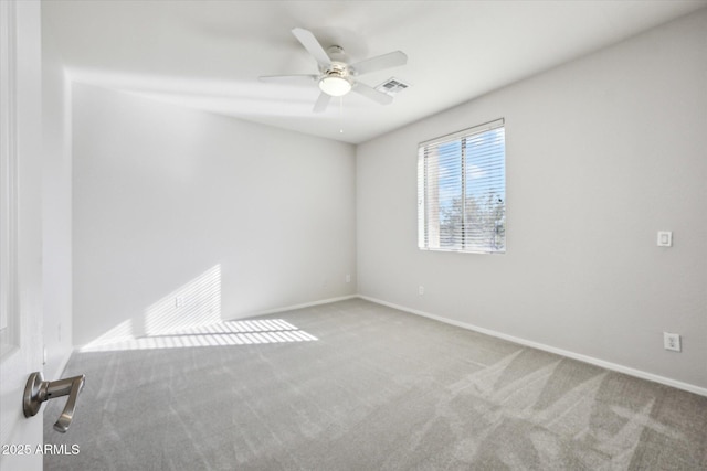 carpeted empty room with ceiling fan