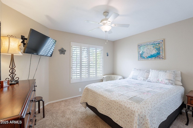 9128 W Kimberly Way, Peoria, AZ 85382 - carpeted bedroom featuring baseboards and a ceiling fan