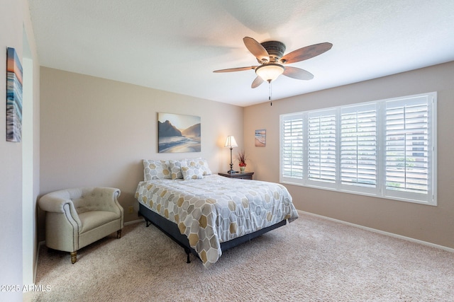 9128 W Kimberly Way, Peoria, AZ 85382 - bedroom featuring carpet floors, baseboards, and a ceiling fan