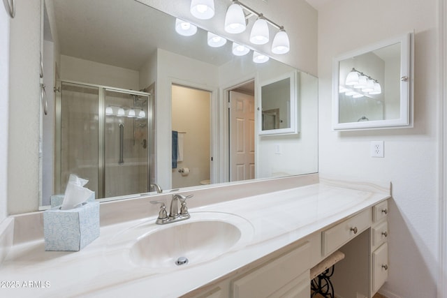 9128 W Kimberly Way, Peoria, AZ 85382 - bathroom featuring a stall shower, toilet, and vanity