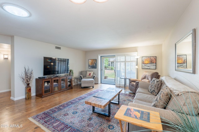 9128 W Kimberly Way, Peoria, AZ 85382 - living room featuring wood finished floors and baseboards
