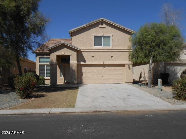 view of property with a garage