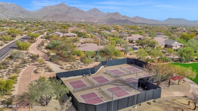 birds eye view of property featuring a mountain view