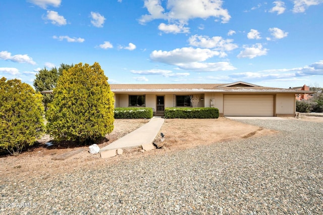 2235 W Mendiburo Way, Prescott, AZ 86305 - single story home featuring gravel driveway, stucco siding, and an attached garage