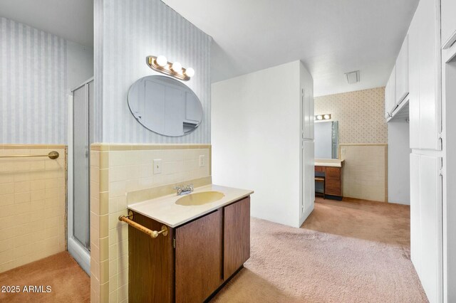 2235 W Mendiburo Way, Prescott, AZ 86305 - bathroom with wallpapered walls, a wainscoted wall, vanity, and a shower stall
