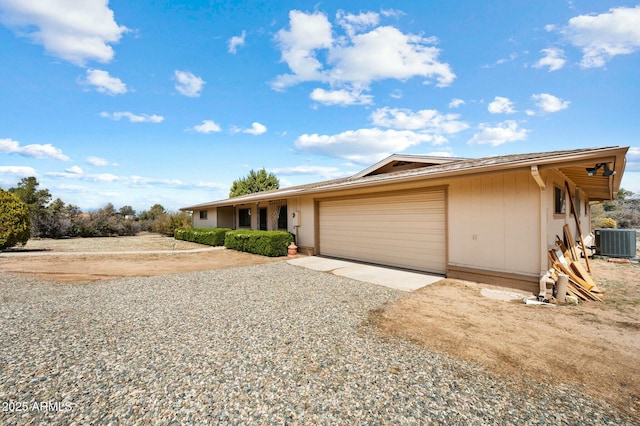 2235 W Mendiburo Way, Prescott, AZ 86305 - ranch-style house with driveway, a garage, and central AC unit
