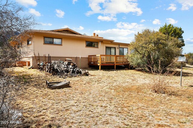 2235 W Mendiburo Way, Prescott, AZ 86305 - rear view of house featuring a chimney and a wooden deck