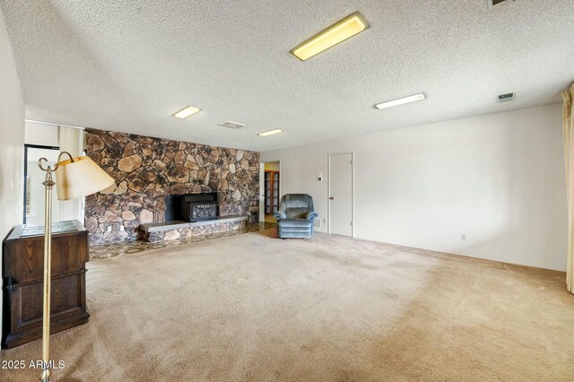 2235 W Mendiburo Way, Prescott, AZ 86305 - unfurnished living room with carpet flooring, a textured ceiling, and visible vents