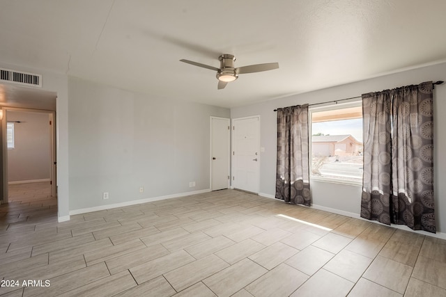 spare room featuring ceiling fan