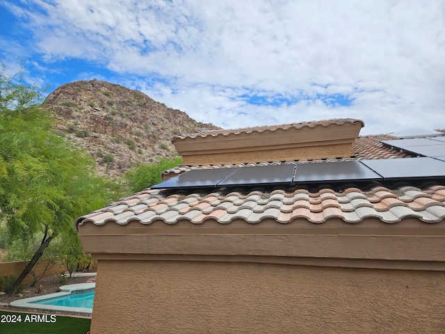 view of side of property featuring a mountain view