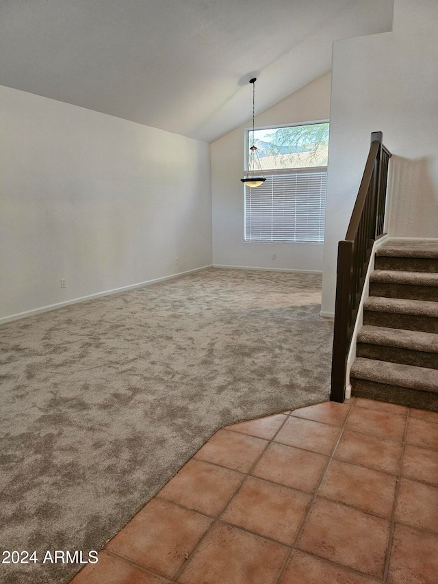 interior space with carpet and lofted ceiling