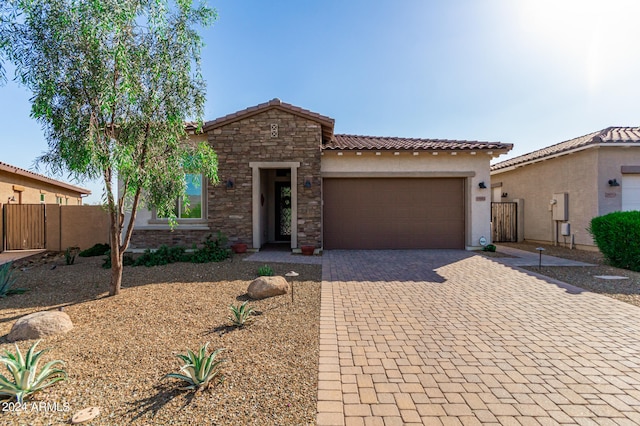 view of front of property featuring a garage