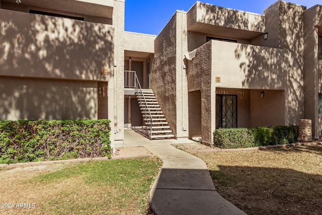 1920 W Lindner Ave Unit 137, Mesa, AZ 85202 - view of exterior entry featuring stucco siding