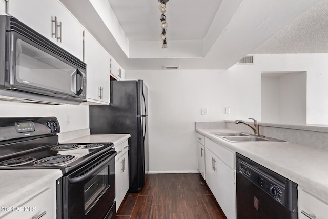 1920 W Lindner Ave Unit 137, Mesa, AZ 85202 - kitchen featuring black appliances, a sink, dark wood-style flooring, track lighting, and light countertops