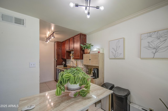 3600 N Hayden Rd Unit 2310, Scottsdale, AZ 85251 - dining area with crown molding and light tile patterned floors