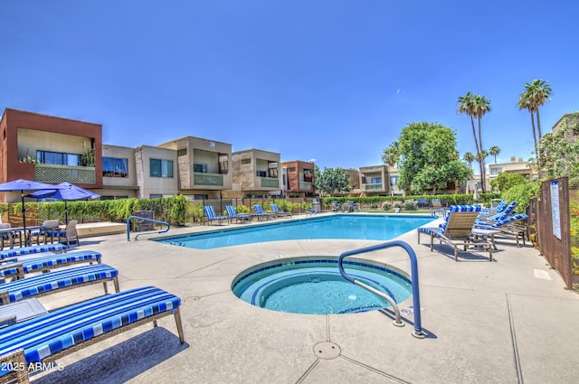 3600 N Hayden Rd Unit 2310, Scottsdale, AZ 85251 - community pool with a hot tub, a patio area, and a residential view