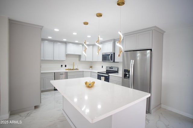 kitchen featuring recessed lighting, a sink, baseboards, marble finish floor, and appliances with stainless steel finishes