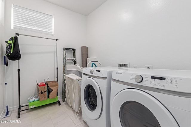 laundry area with independent washer and dryer