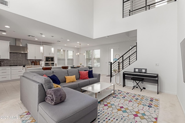 living room with a towering ceiling