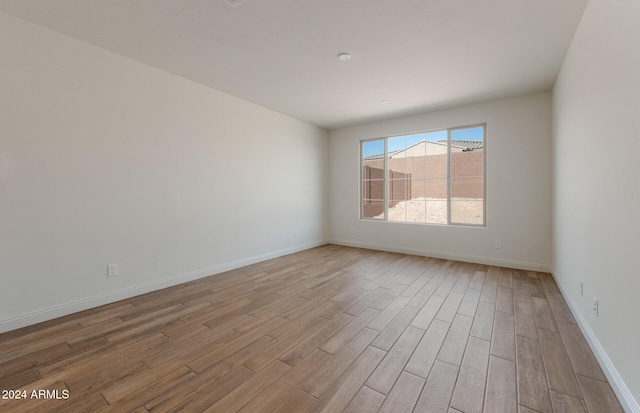 empty room with light wood-type flooring