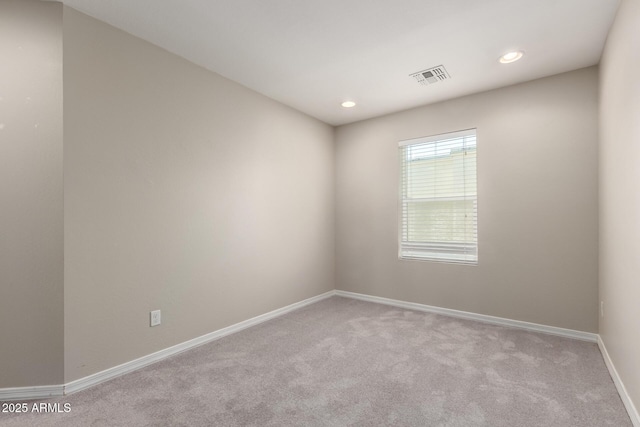 2000 N 36th St Unit 19, Phoenix, AZ 85008 - carpeted spare room featuring baseboards and recessed lighting