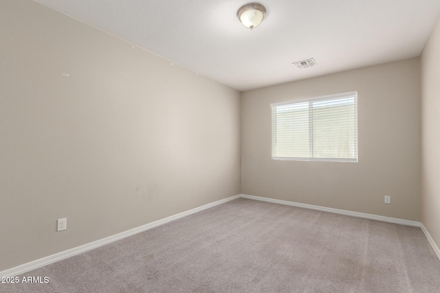 2000 N 36th St Unit 19, Phoenix, AZ 85008 - empty room with baseboards and light colored carpet