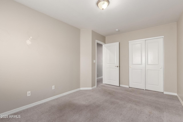 2000 N 36th St Unit 19, Phoenix, AZ 85008 - unfurnished bedroom featuring carpet flooring and a closet
