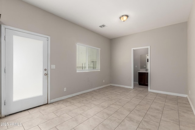 2000 N 36th St Unit 19, Phoenix, AZ 85008 - empty room featuring light tile patterned floors and baseboards