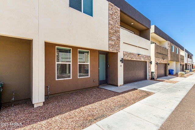 2000 N 36th St Unit 19, Phoenix, AZ 85008 - view of property with a garage and driveway