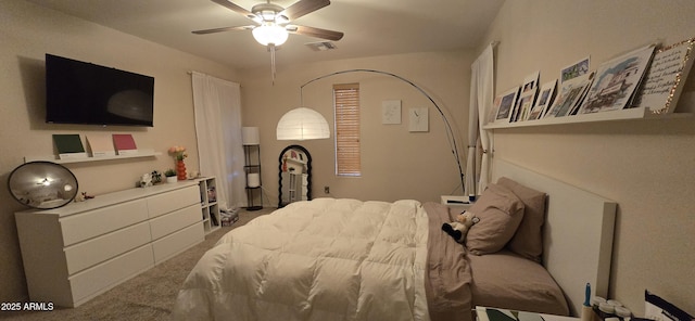 bedroom featuring carpet, visible vents, and ceiling fan