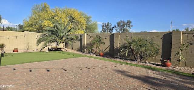 view of patio with a fenced backyard