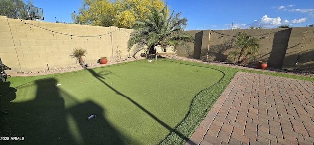view of yard featuring a fenced backyard